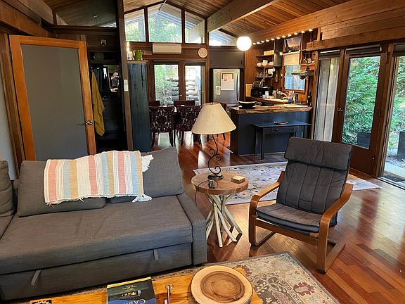 Looking from living room area to kitchen/dining area and back