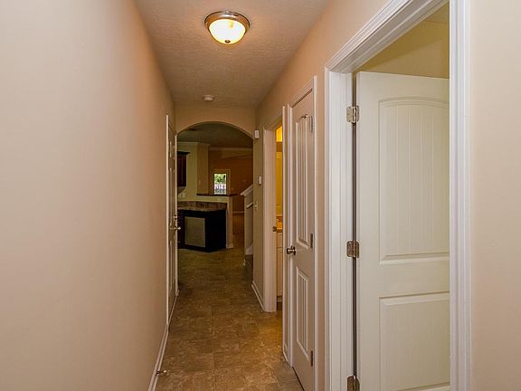 Entry view, in order of rooms on the right: first bedroom (n