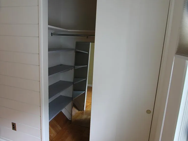 Master bedroom closet with shelves