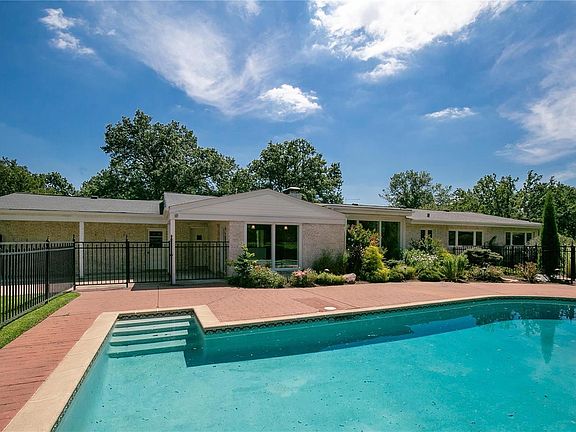 The private in-ground saltwater pool with upgraded pump, lines, interior and exterior surfaces
