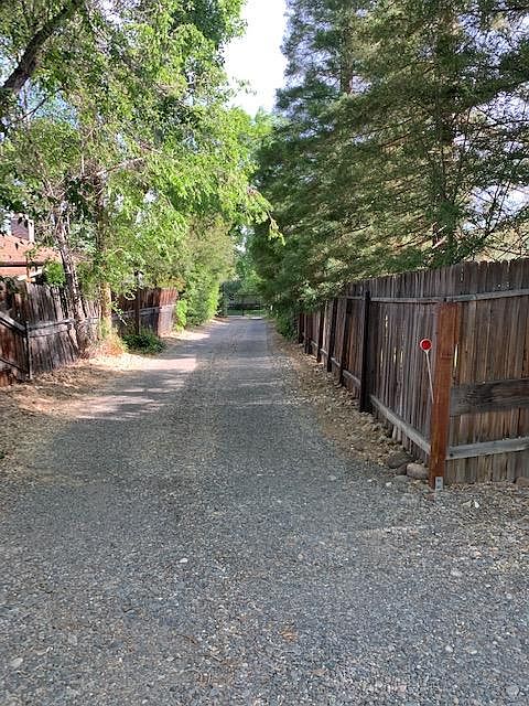 Driveway behind gate from street