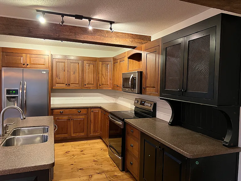 Custom kitchen with lots of storage.
