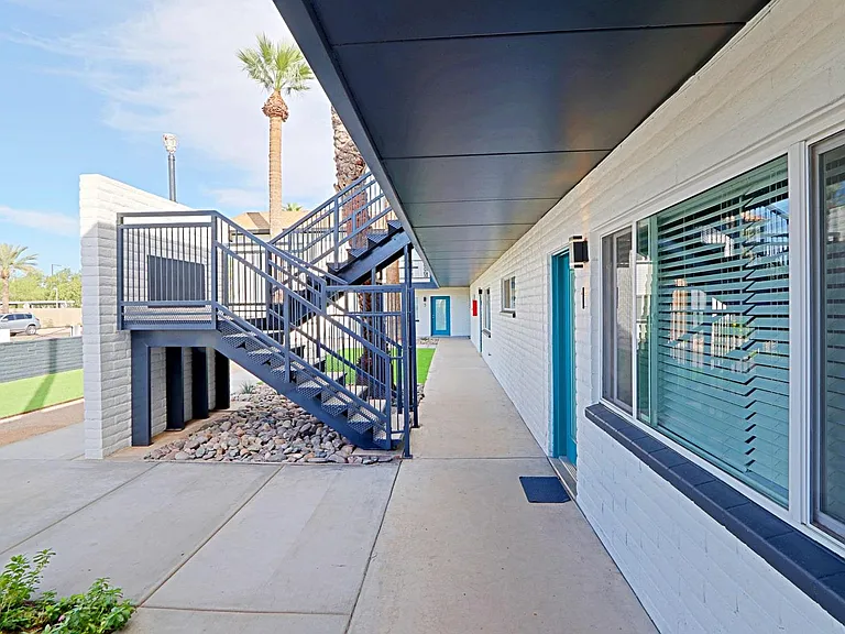 Open breezeways for easy access to homes and parking.