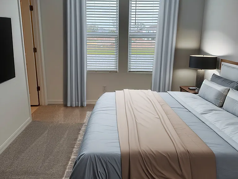 Virtually staged second bedroom water view