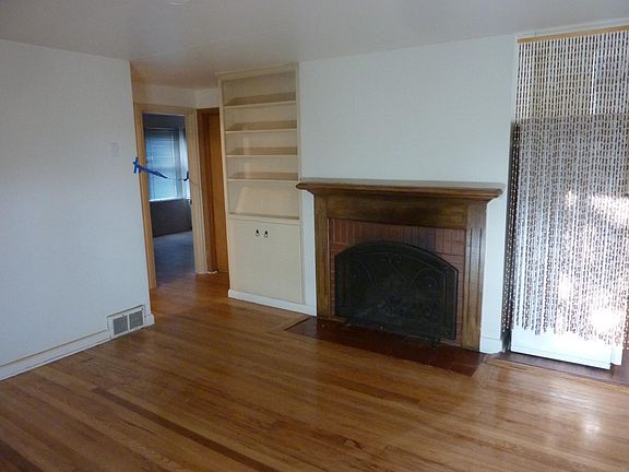 Living room with ornamental fireplace