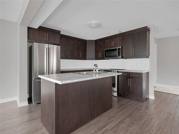 4th image of 9573 Tallgrass Ave