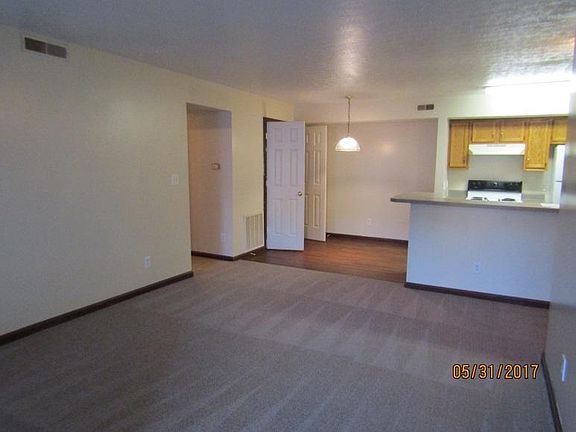 livingroom looking at dining / kitchen