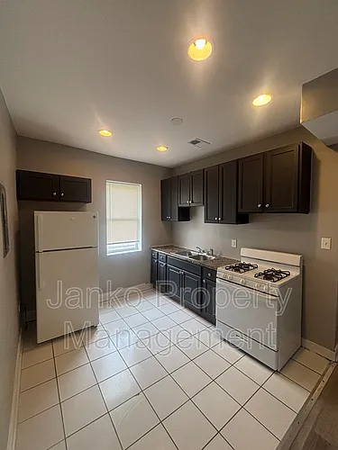 7053 S Dante Ave #2F Photo 1