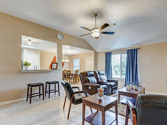 Living room open to dining and Kitchen