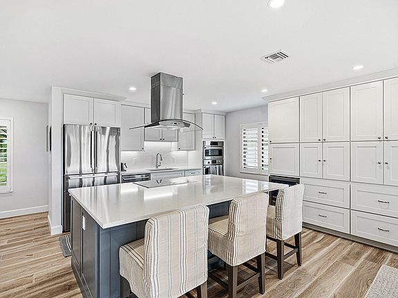 2nd image of 10157 Quail Covey Road #Hibiscus N