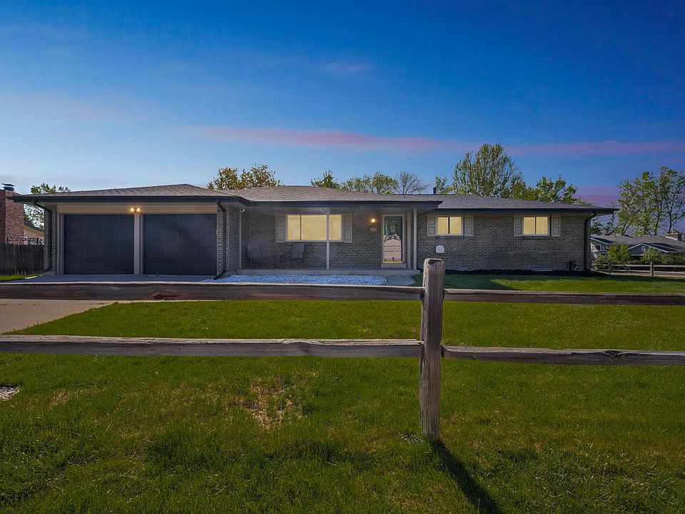 Welcome home to your updated charming brick ranch in Arvada, CO