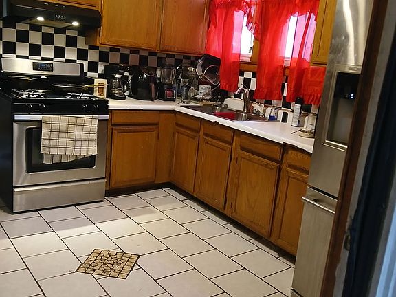 4th image of 6942 S Bell Ave