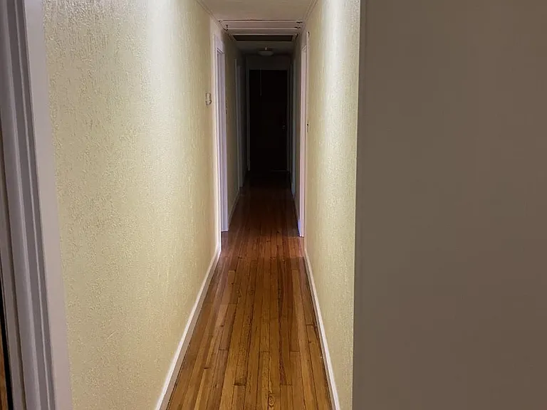 Second Floor Hall to bedrooms on driveway side and Lanning
