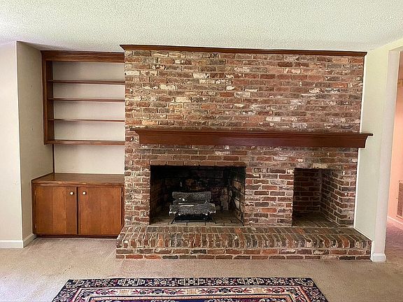 Built-in and gas fireplace.