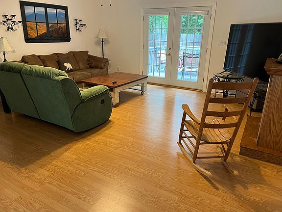 Large livingroom with hardwood floors.