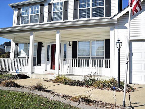 Imagine how much time you will spend on this covered front porch!  Low maintenance vinyl siding, concrete "Curb Appeal" around a