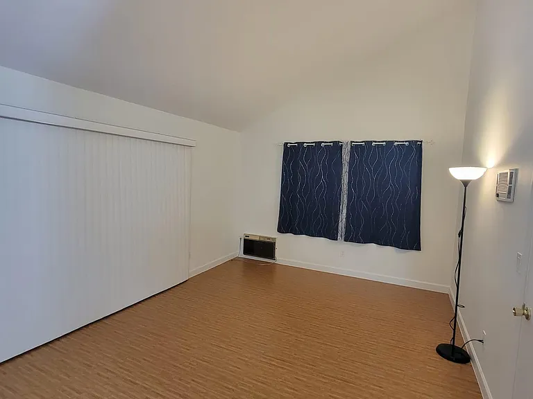 Master Bedroom has a 10ft wide sliding door with brand new vertical blinds