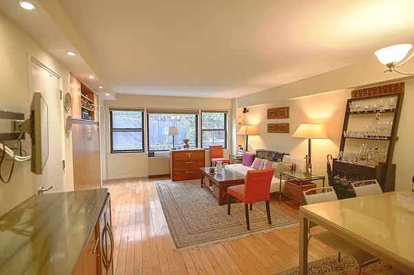 1st image of 55 E 9th St APT 1C