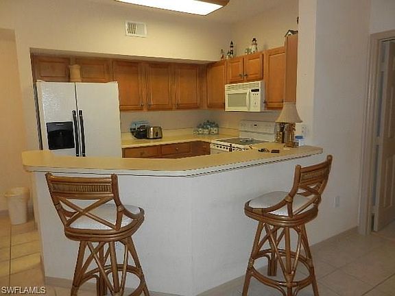 5th image of 15585 Ocean Walk Cir APT 210