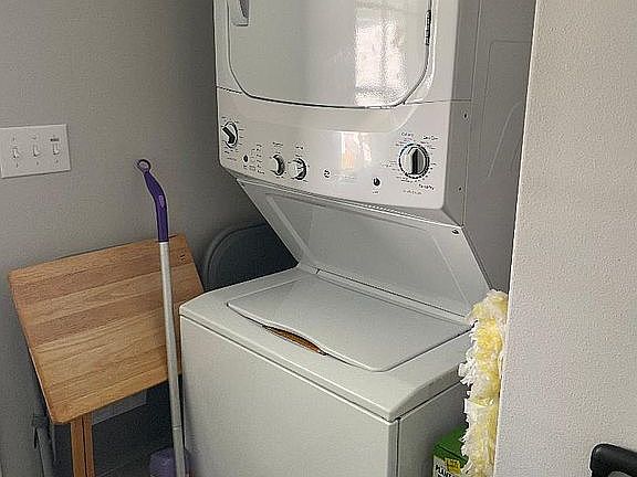 Washer & dryer @ side door.