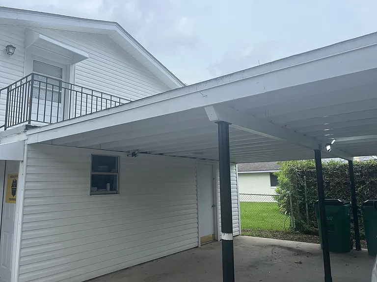 Carport area and door into laundy/utility room