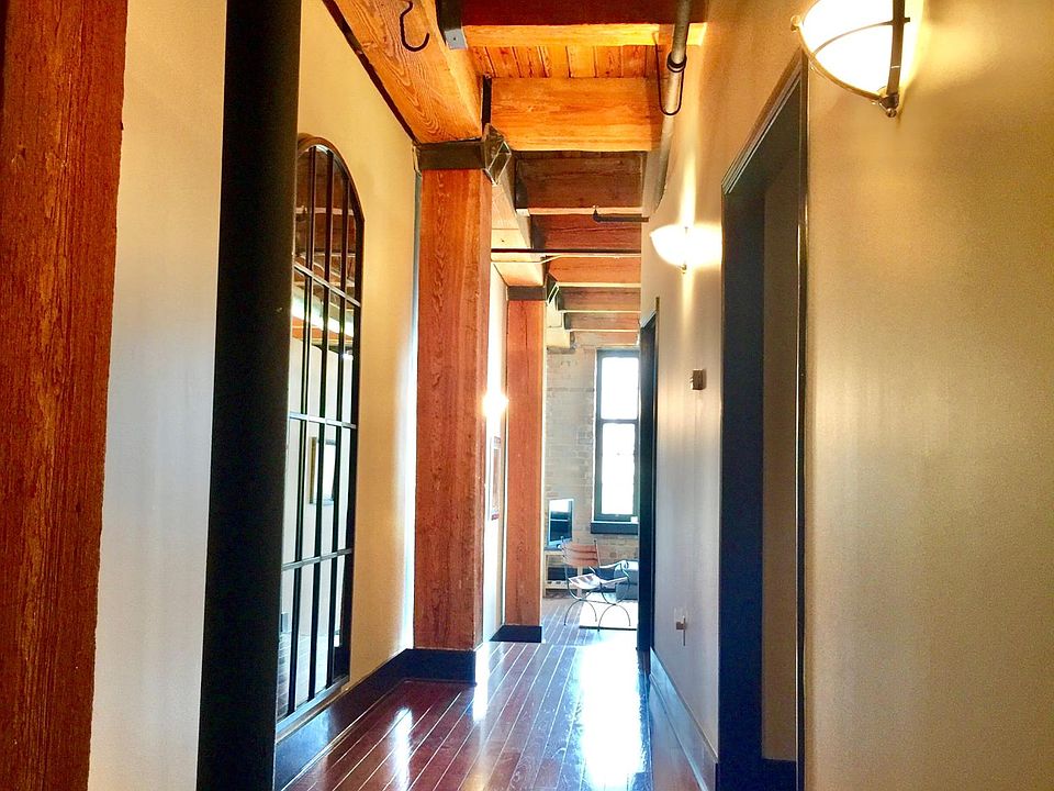 Entry hall. Gorgeous wood beams, ceiling and floors