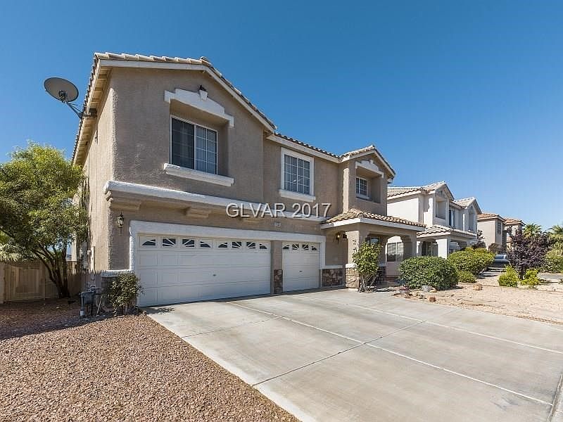 Stately 2-story with 3-car garage in gated community.