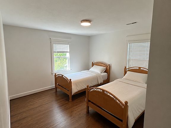 Bedroom is approx 12x10. Large closet, new light fixtures, new blinds, and lots of natural light.
