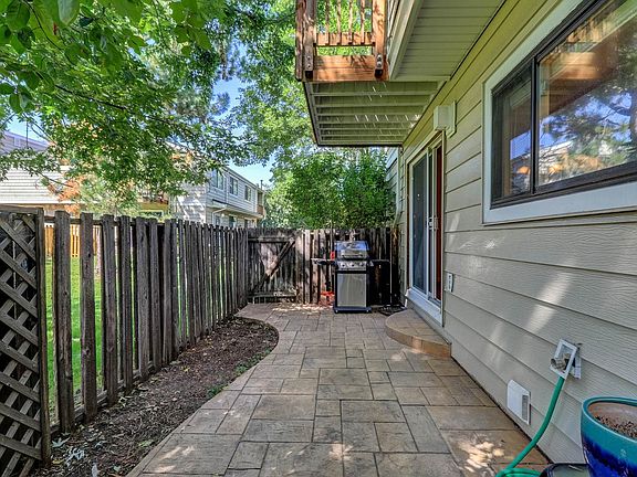 Private patio; opens to green space perfect of BBQs and dog