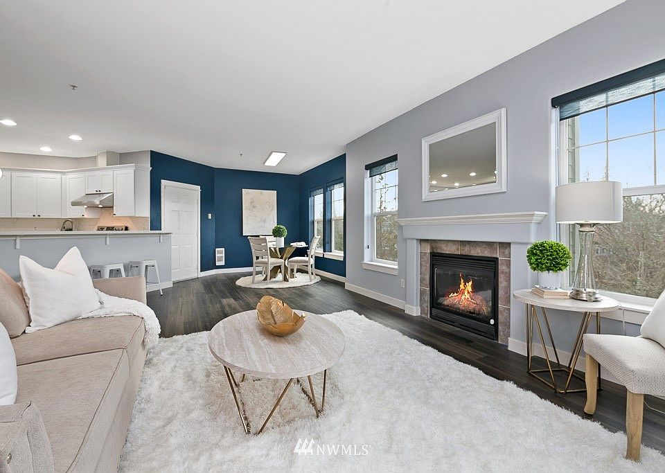 Luxury and tranquility meet in this captivating top-floor end unit, meticulously renovated. Enjoy hardwood flooring  and fresh paint throughout. Steps to the Cascara Park, schools & trails! 