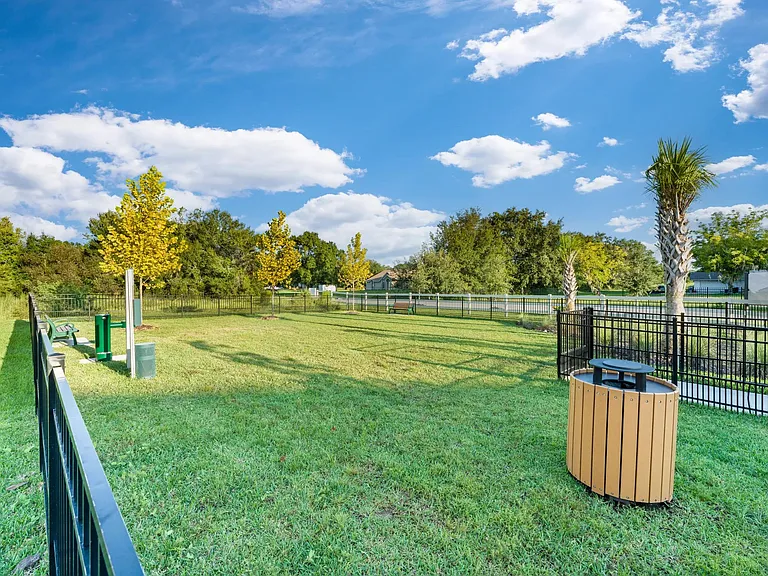 A spacious dog park at Amavi Kissimmee keeps you near local trails and outdoor spots, offering a convenient place for pets to play and unwind.