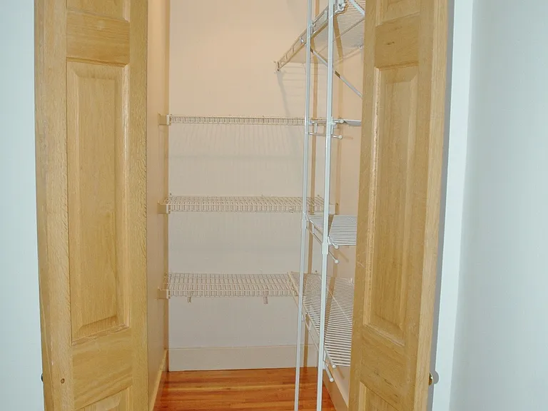 Left bedroom walk in closet