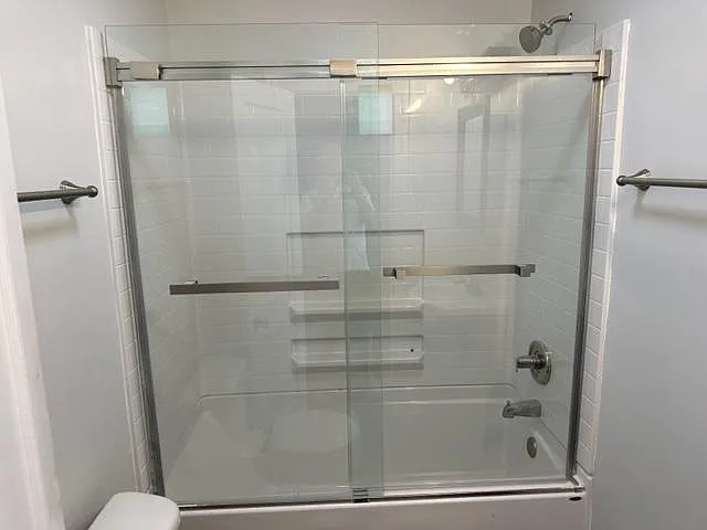 updated bathroom with soak tub and new flooring