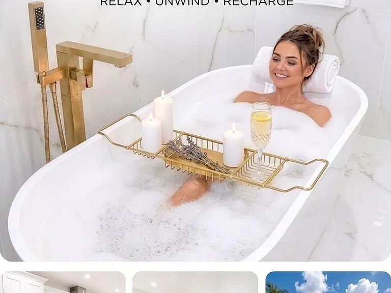 Tiled bath with a soaking tub and brushed-gold fixtures, offering a relaxing space for daily routines.
