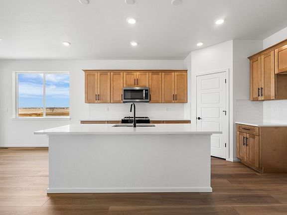 Bright, modern kitchen with large island
