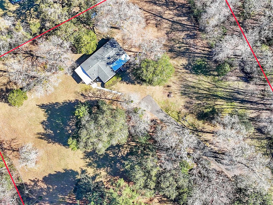 Extent of the property, showing large fenced lawn areas with beautiful trees
