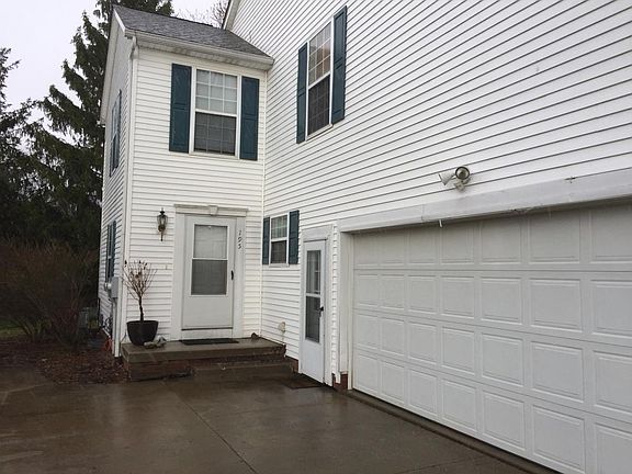 Front entrance with 2 car garage