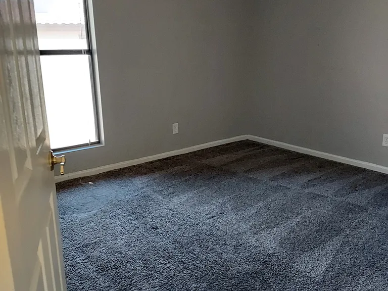 2nd downstairs bedroom off the full bathroom and full laundry