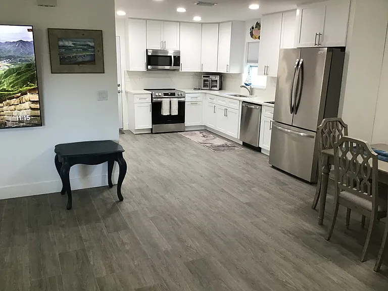 Expansive open layout ideal for executive living and extended stays.