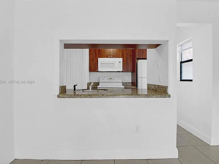 9730 Hammocks Blvd #203-28 — Photo 3