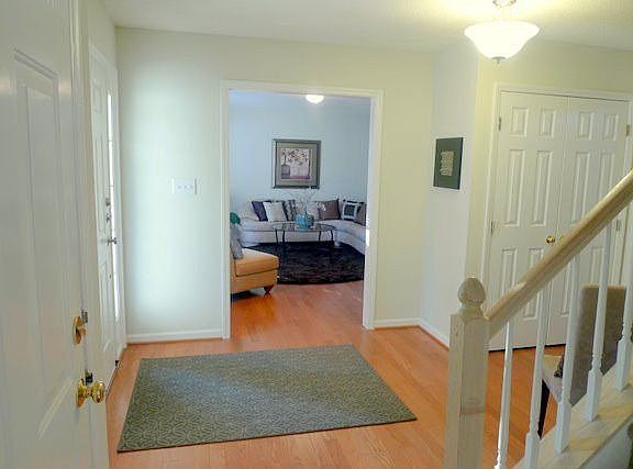 Foyer opens to formal living room or it can be office space if needed.