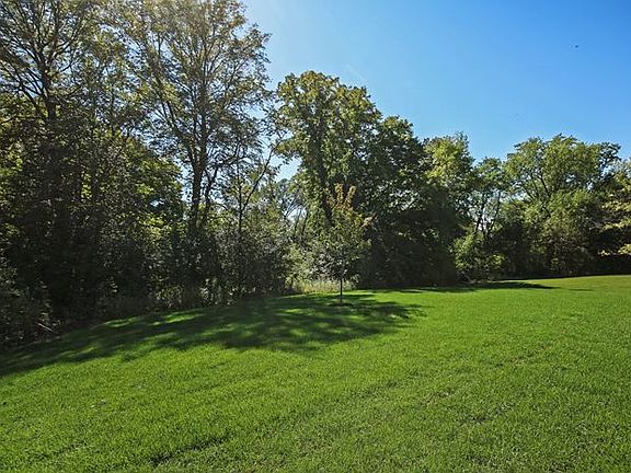 1/2 acre private wooded lot