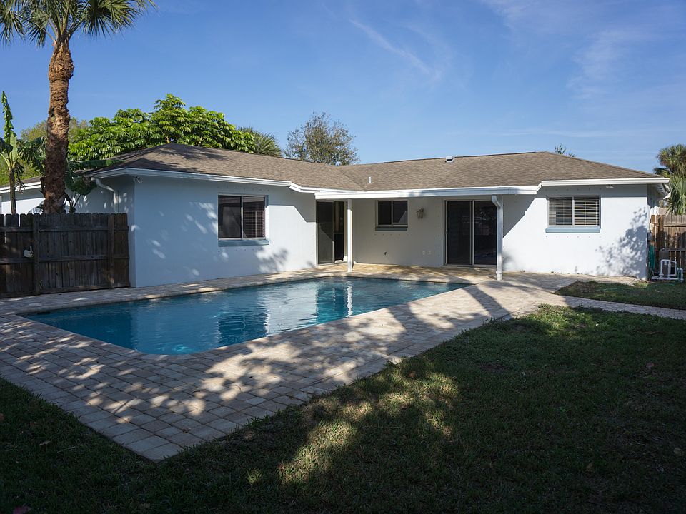 Fenced in yard with pool