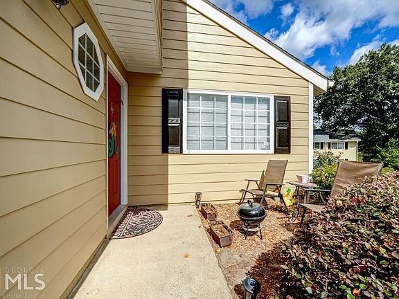 You receive a private entrance with this end unit townhome.