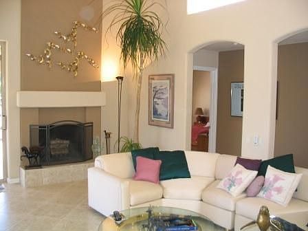 Great room with fireplace & vaulted ceiling