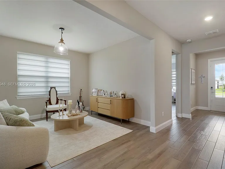 6489 NW Cloverdale Ave — Photo 25