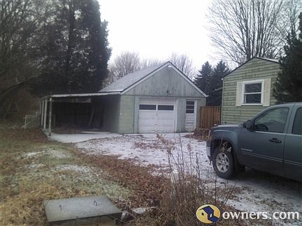 Front/Left Side and Garage/Carport