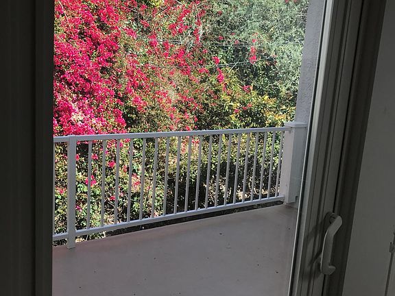 Back balcony off of master bedroom. Double sliding doors.