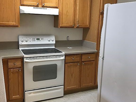 Kitchen floor is tiled