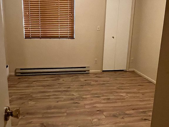 Master bedroom with walk in closet and half bath